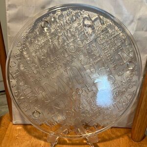 Like new. Lovely glass 11” circular cake or pie dish with tiny legs n cut names